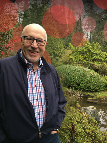 Mark E. McNeil in a garden