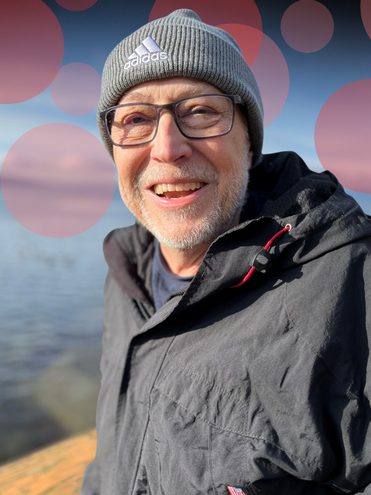 Mark E. McNeil by the water